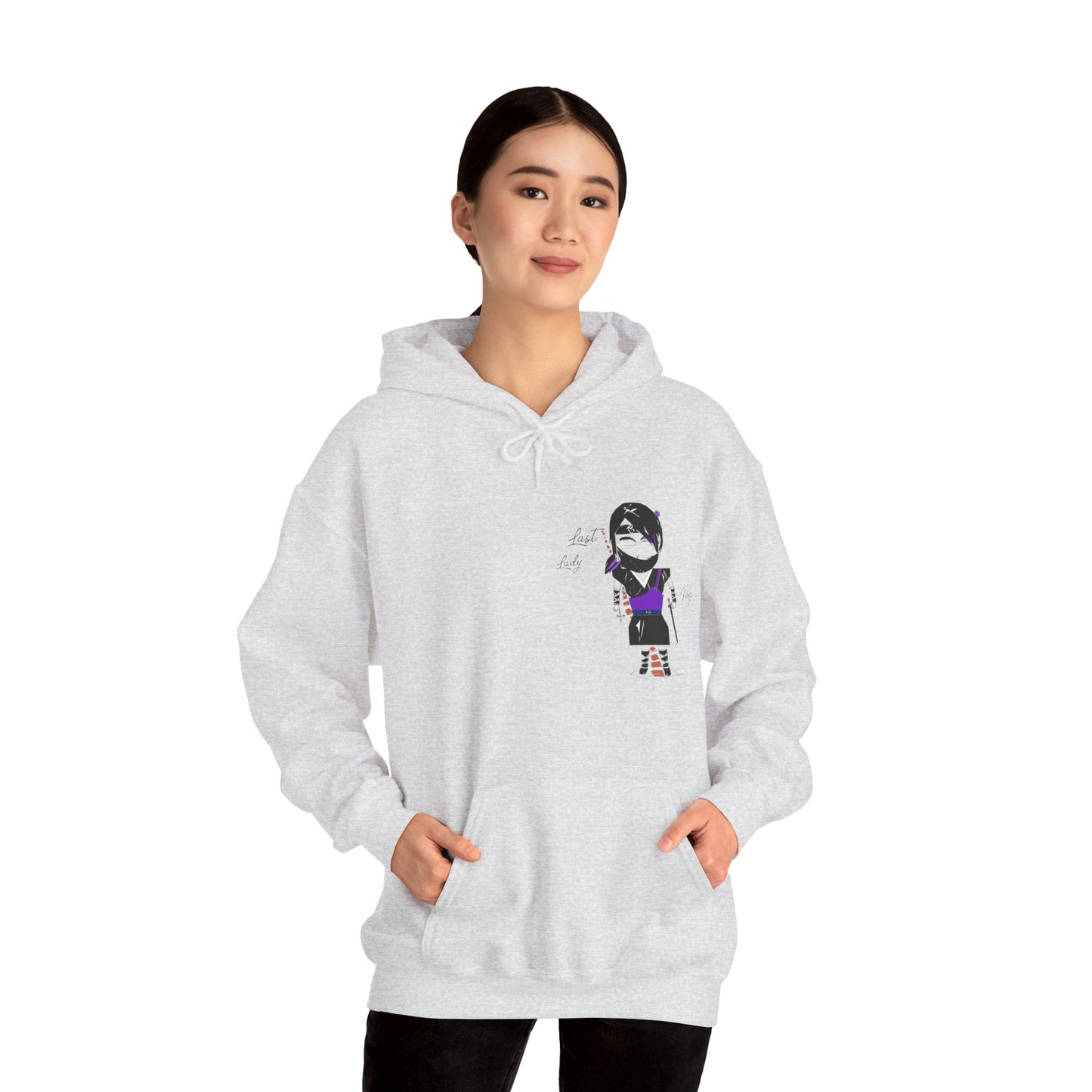 Front view of a lady model wearing a gray hoodie with a lady ninja graphic design on a white background