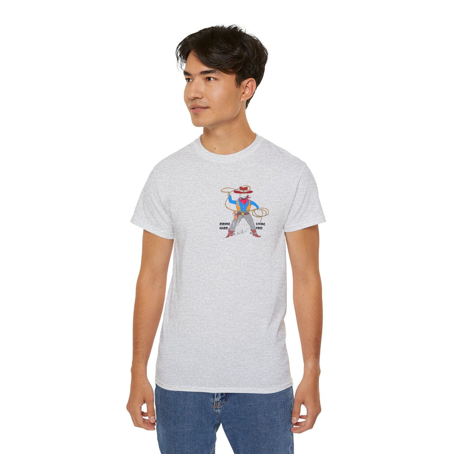 A man model wearing a gray t-shirt with a cowboy graphic design standing on a white background