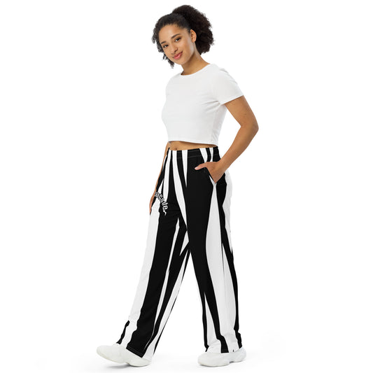 Woman wearing a white crop top and black and white striped pants with a 'Fun Wear Code' text logo on a white background