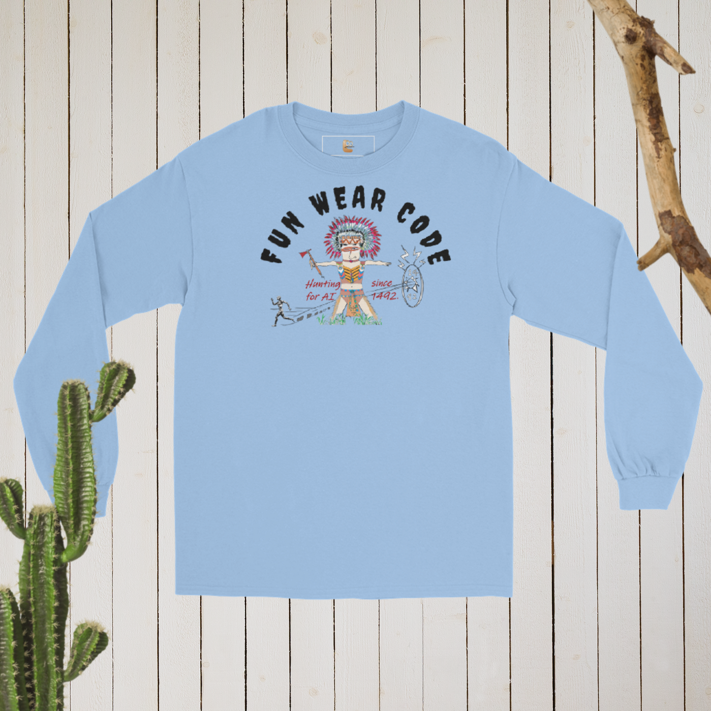 Light blue long-sleeve shirt with a playful American Indian graphic design and text "Fun Wear Code" on a wooden background