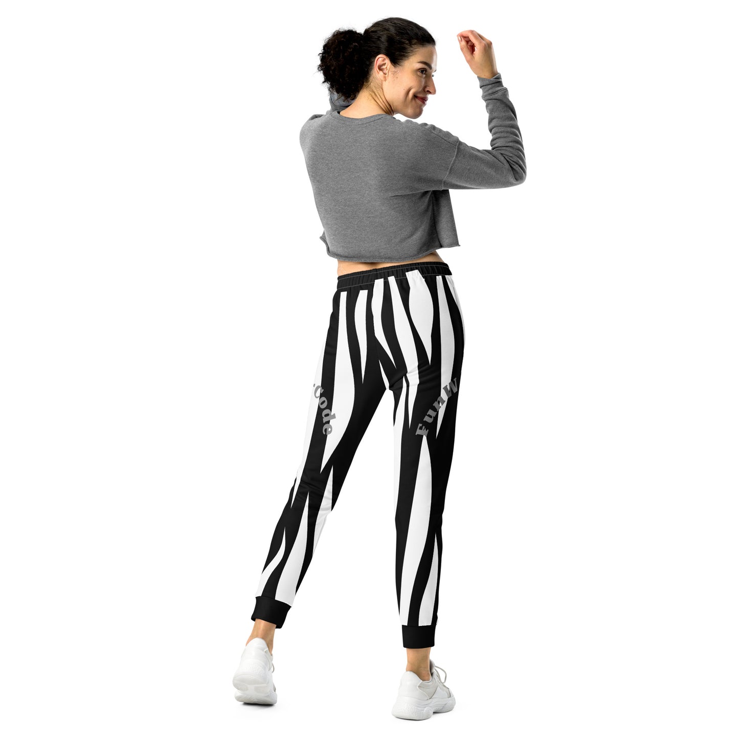 Woman wearing a gray cropped top and black and white striped pants with a 'Fun Wear Code' text logo on a white background