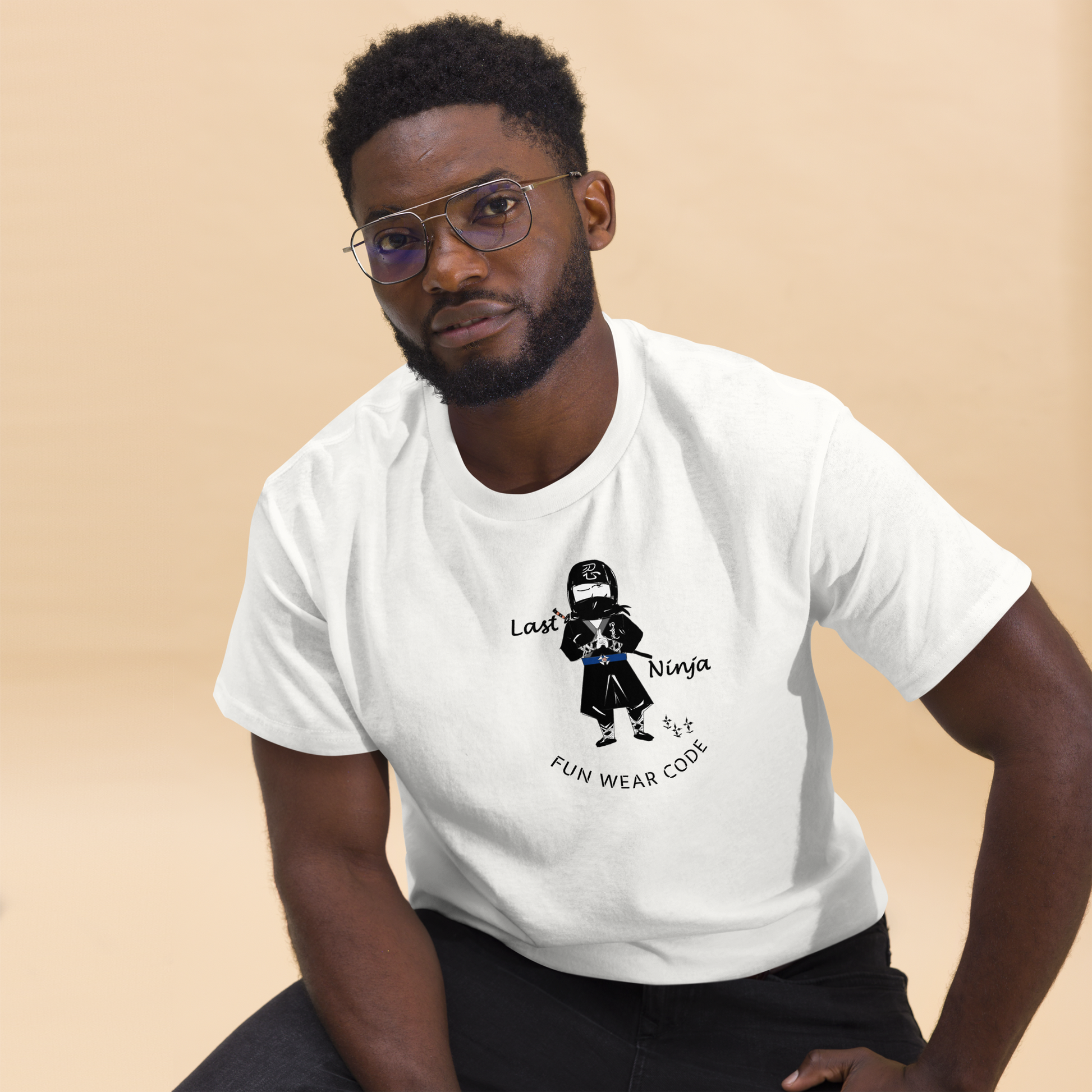 Man wearing a white t-shirt with a playful "Last Ninja" graphic design and text "FUN WEAR CODE" on a beige background