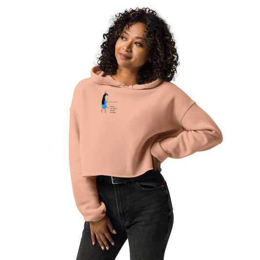 Front view of a lady model wearing a peach cropped hoodie with an American Indian woman graphic design on a white background